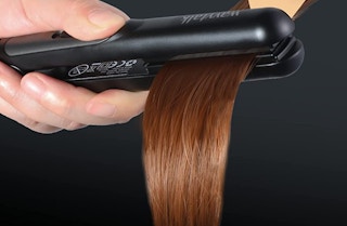 a mini flat iron straightening hair