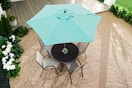 Lifestyle image of a teal Stylewell Patio Umbrella (aerial view)