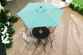 Lifestyle image of a teal Stylewell Patio Umbrella (aerial view)