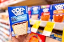 hand holding pop-tarts at walgreens