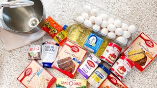 ingredients for making lots of box cakes on a counter