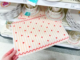 hand holding a pillowfort valentines placemat on target shelf