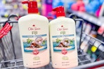 2 large bottles of old spice body wash in a cart