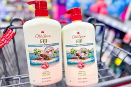 2 large bottles of old spice body wash in a cart