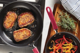 rachael ray frying pans on a table