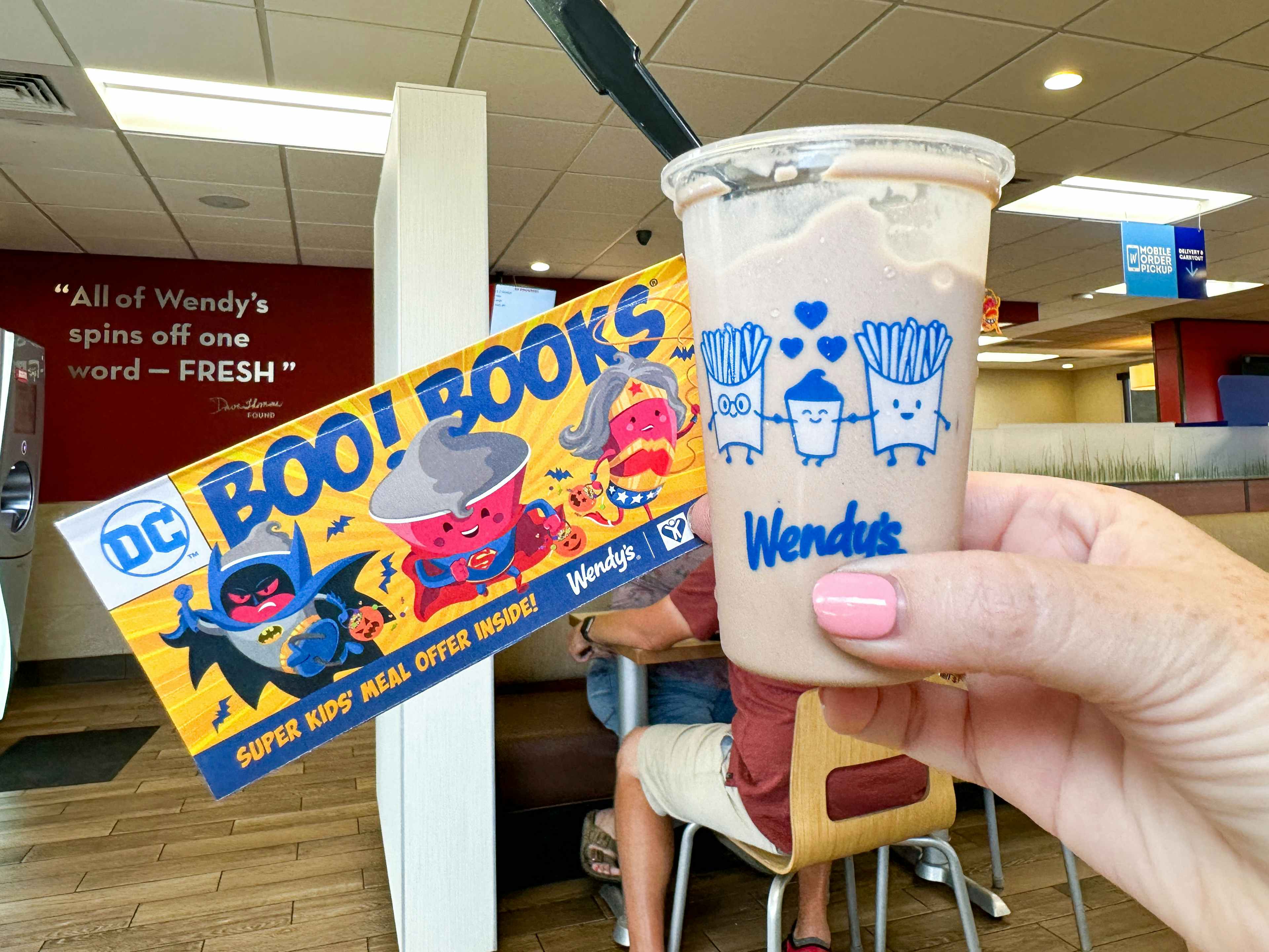 a wendys frosty and boo books being held up in store 