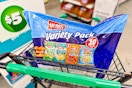 hand holding a herr's chips vareity pack at dollar tree