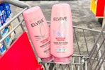 2 bottles of loreal elvive conditioner in a cart