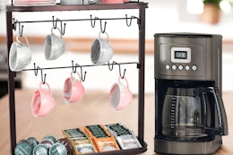 a mug organizer next to a coffee machine