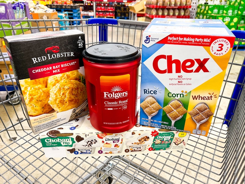 red lobster biscuit mix, folgers coffee, chex cereal, and chobani flip yogurt in a cart