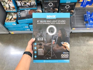 hand holding bower ring studio light