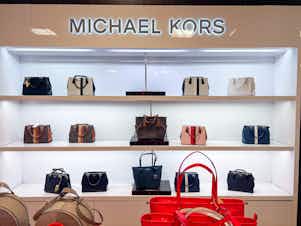 Handbags on display at the Michael Kors boutique within Macy's in