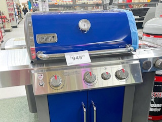 a blue weber grill at ace hardware with a $949 price tag on it