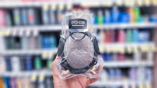 hand holding axe body scrubber