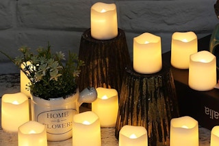 LED candles lit on table