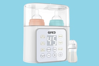 Stock photo of Gped bottle warmer over blue background