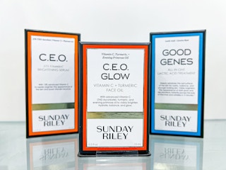 skincare products on a pink background