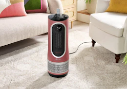 a pink air purifier in a living room