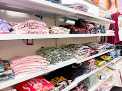 women's graphic tees sitting on a target shelf
