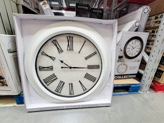 a 30-inch farmhouse style white framed clock