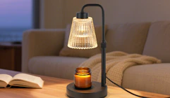 a candle warmer lamp on a table