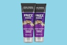 two purple and grey tubes of hair creme