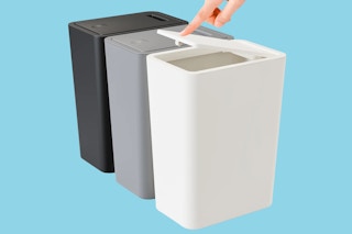 Stock image of the Tinana trash can 3pk in white grey and black over blue background