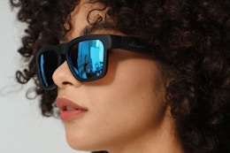 a woman wearing smart glasses