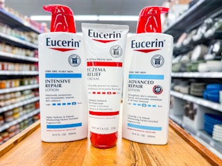 three bottles of eucerin on counter at walmart