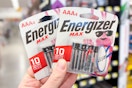 hand holding energizer batteries