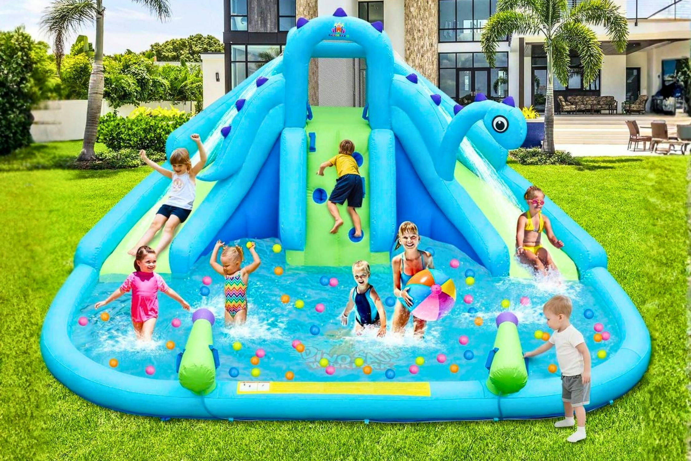 Lifestyle image of a inflatable water park set up outdoors