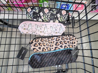 4 kendall & kylie cosmetic bags in a cart