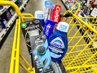 axe car freshener, dawn power wash, air wick warmer, crest toothpaste, colgate toothpaste and toothbrush in a cart