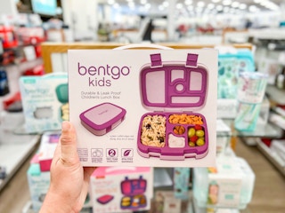 someone holding up a bentgo lunch box