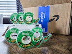 Scotch tape near. Amazon box