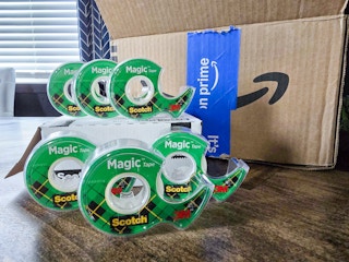 Scotch tape near. Amazon box
