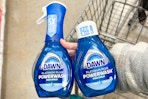 hand holding dawn powerwash dish soaps