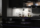 light turned on under a cabinet in a kitchen