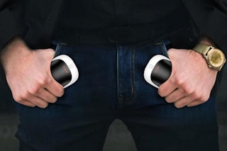 a man holding hand warmers