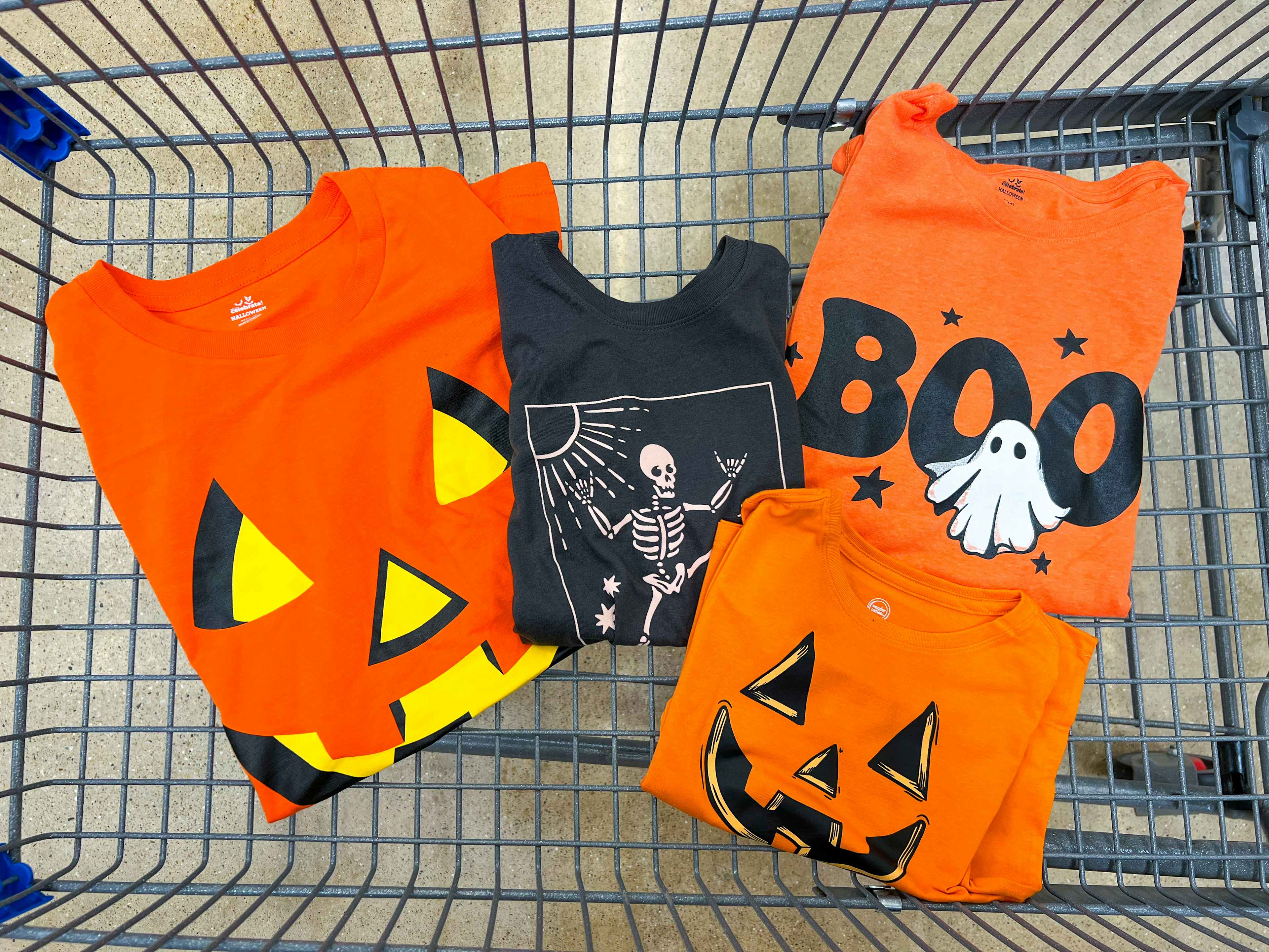 four halloween tees in walmart cart