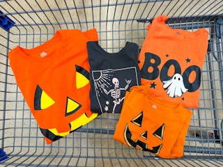 four halloween tees in walmart cart
