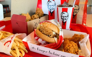 A tray of food from KFC on a table