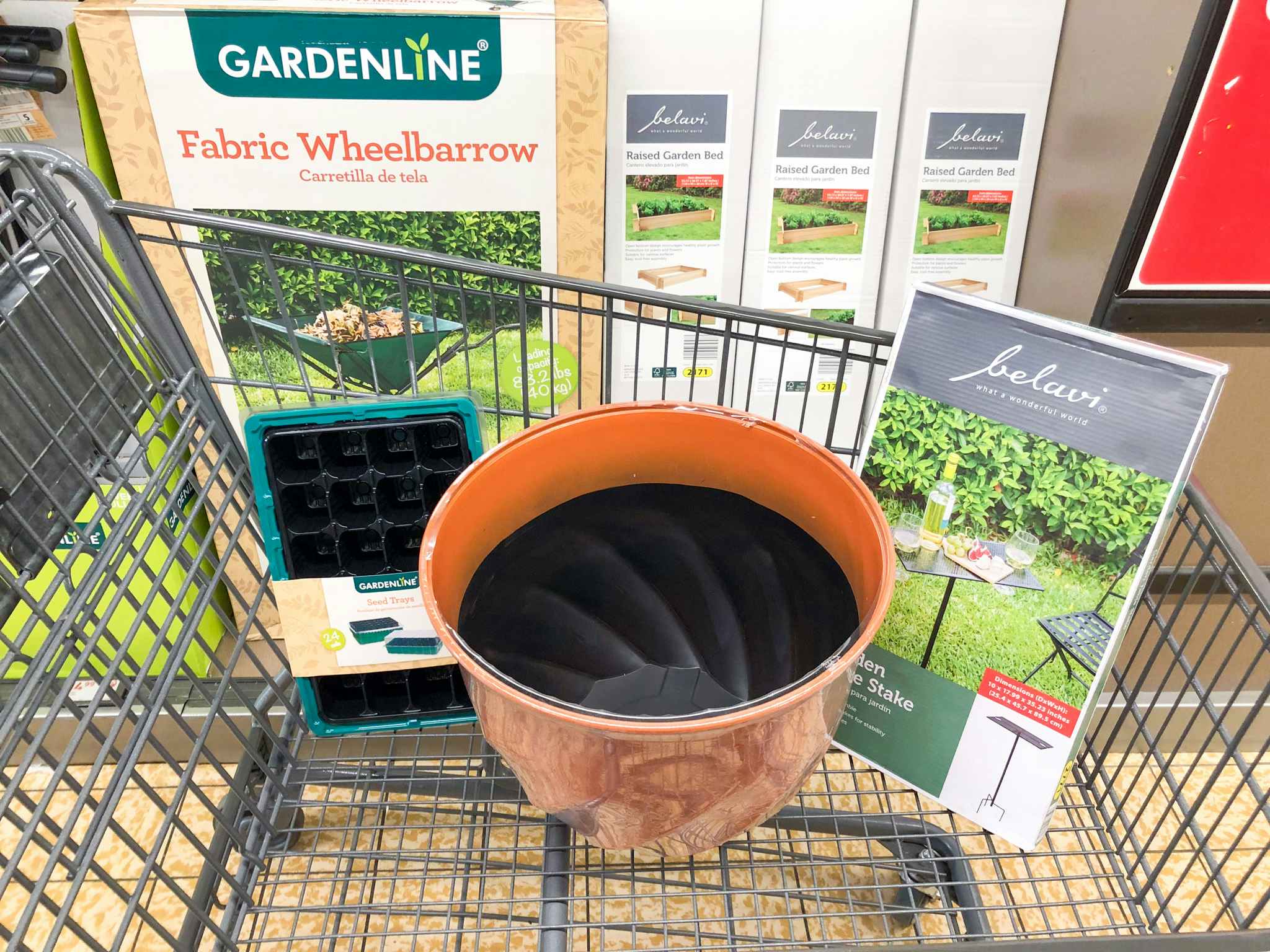 aldi finds gardening deals planter seed tray stake garden bed wheelbarrow