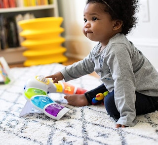 baby einstein colorful ring toy with a baby