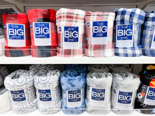 the big one plush throw on shelf