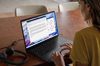 Woman working from Dell 15 Laptop