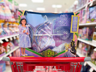 disney wicked fantasy dress set sitting on a target cart