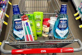 crest mouthwash, kiss nail files, garnier shampoo, degree deodorant, and old spice deodorant in a cart
