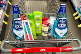crest mouthwash, kiss nail files, garnier shampoo, degree deodorant, and old spice deodorant in a cart