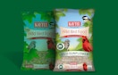 bags of bird seed on a green background